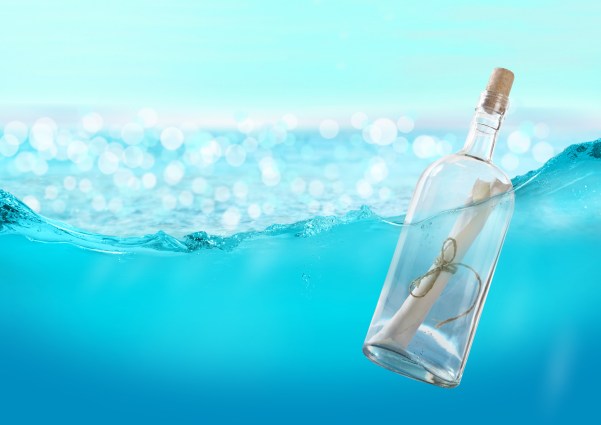 Bottle with a message in the water.